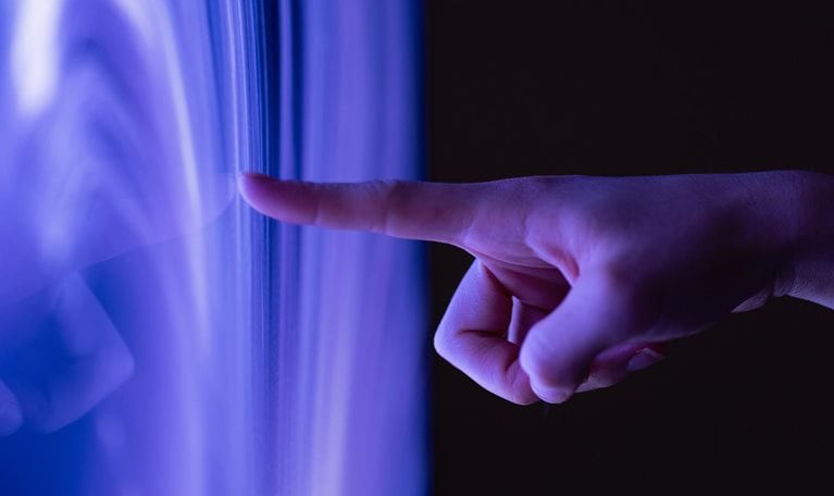 Connect to the future, Close-up of extended finger clicking computer screen