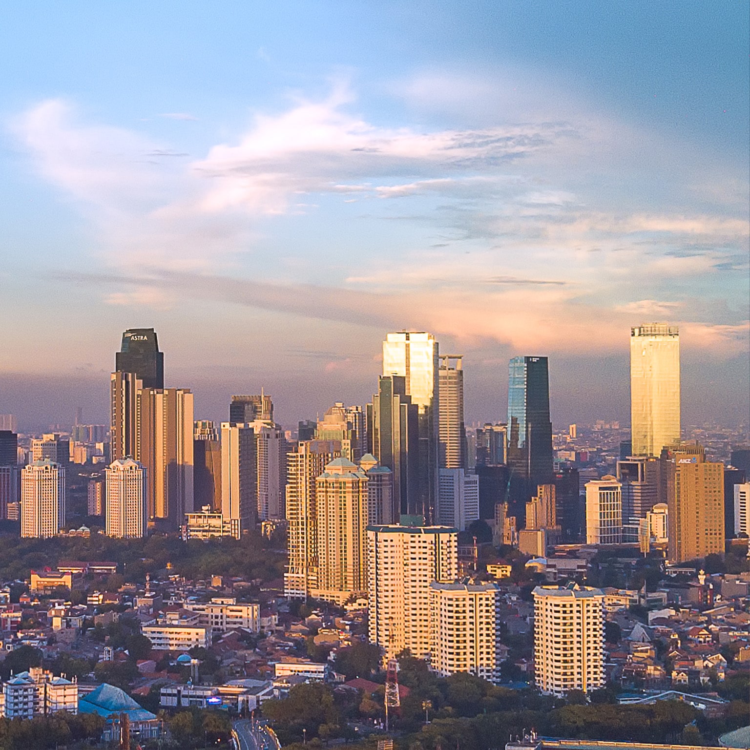 Jakarta, capital city of Indonesia during blue hour with iconic buildings