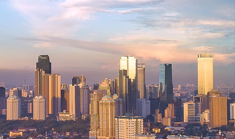 Jakarta, capital city of Indonesia during blue hour with iconic buildings