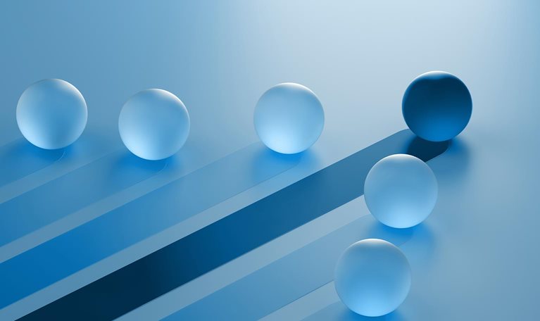 The image is an abstract 3D render showing translucent blue spheres on a light blue surface, with one darker blue sphere standing out. Winning Strategy, Efficiency, Innovation, Success in Business Concept, Teamwork and Leadership.