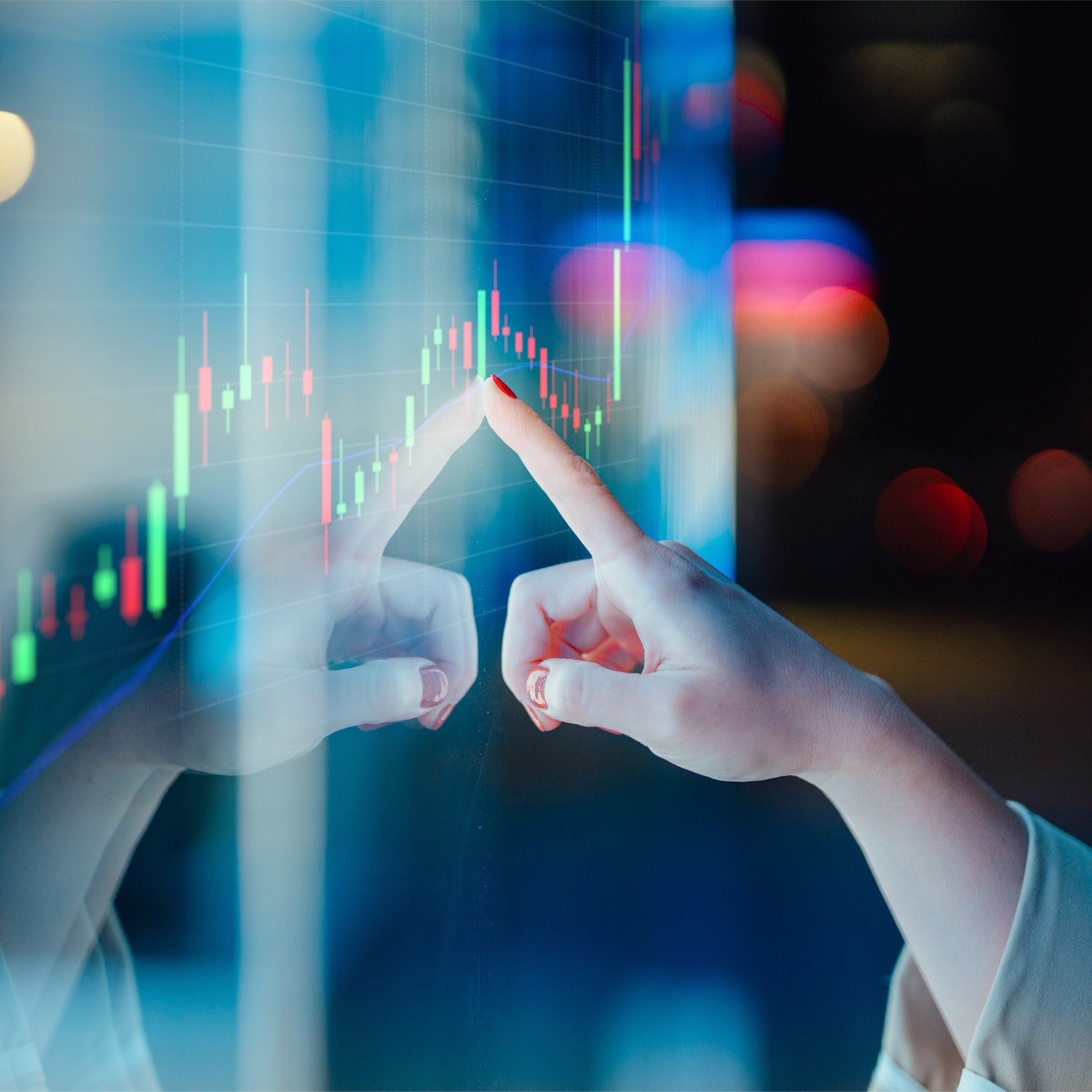 Businesswomen touching stock market graph on a virtual screen display - stock photo