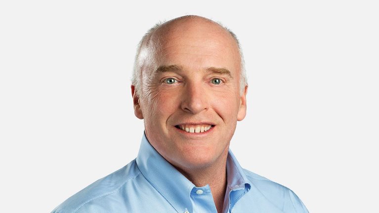 Portrait of author Rob Cross with a friendly smile