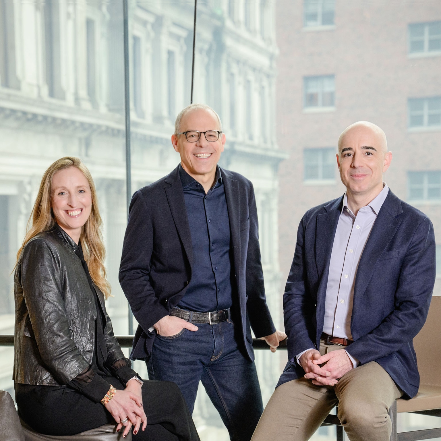 Photo of the authors of the Rewired book, Eric Lamarre, Robert Levin, and Kate Smaje, sitting together