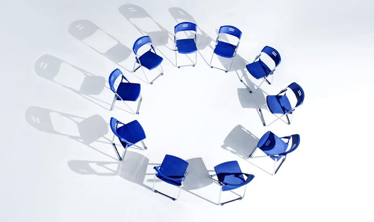 Circle of blue chairs