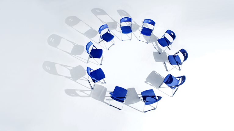 Circle of blue chairs