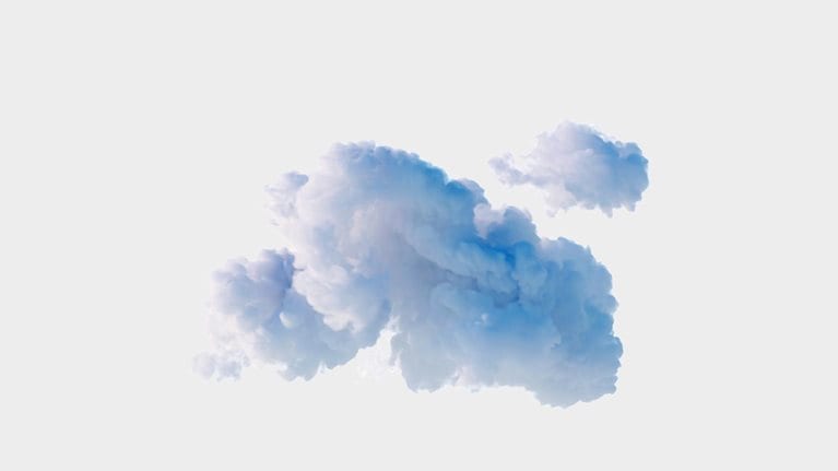 A fluffy cumulus cloud with blue toned shadows set against a gray background.