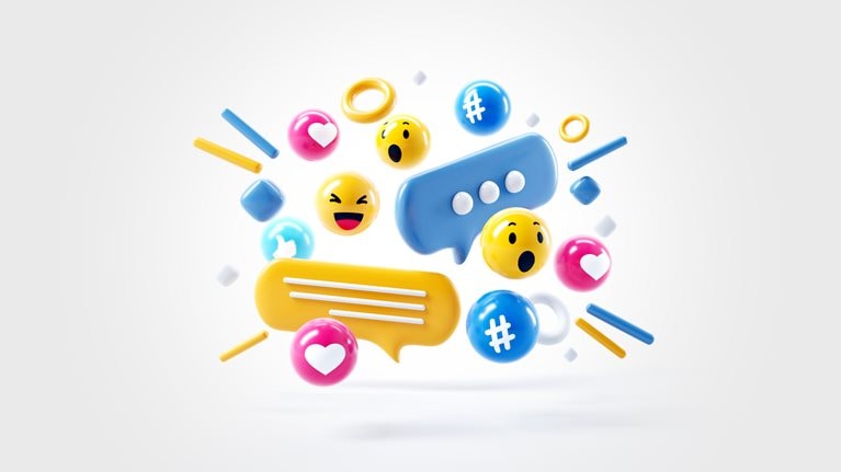 A energetic and tightly grouped collection of social media reaction icons including hearts, thumbs up, happy and surprised faces along with comment and texting bubbles and hashtags. 