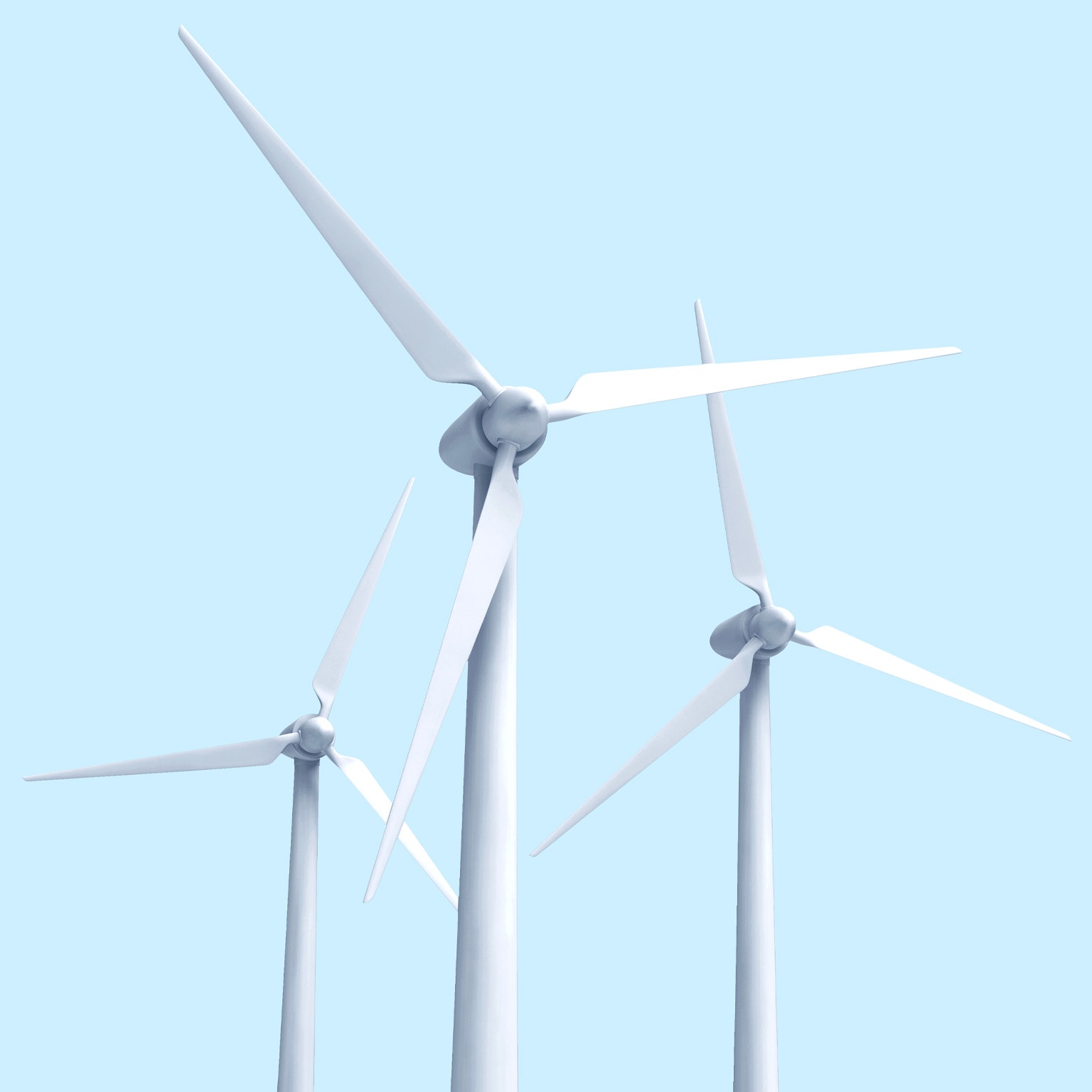 3 wind turbines against a light blue sky. 