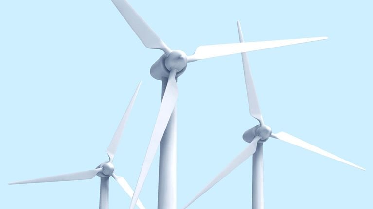 3 wind turbines against a light blue sky.