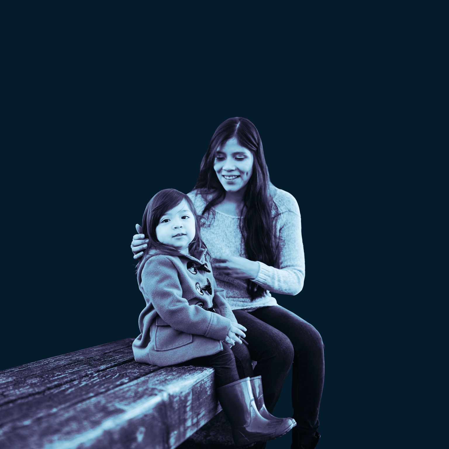 Women and young girl sitting together