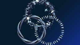 Rendering of three overlapping rings in the image of vegetation and people