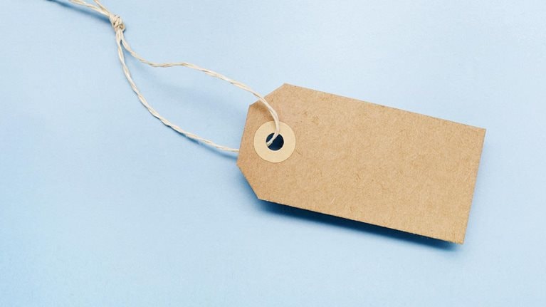 Paper tag on a string