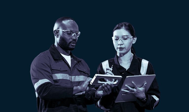 Two engineers are discussing parts