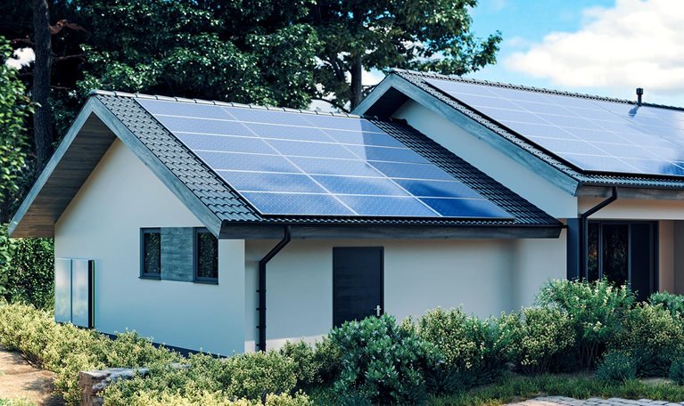 Energy efficient house with solar panels and wall battery for energy storage