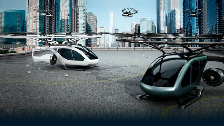 Conceptual eVTOL aircrafts as a taxi/shuttle service at the helipad on top of a building - stock photo