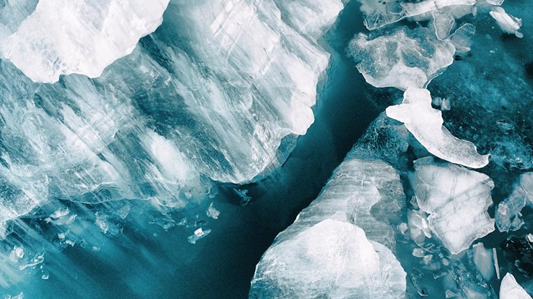 Small icebergs broken off from the large glacier at Vatnajökull, Iceland. Image was taken with a drone.