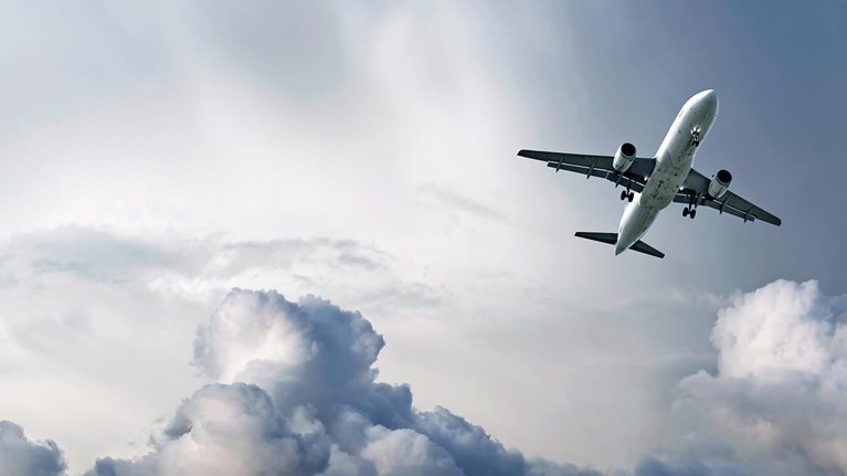 Jet plane landing in a storm