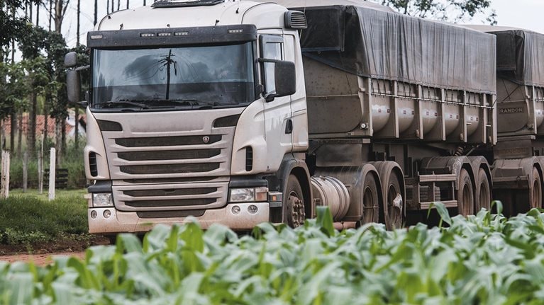 Truck next to a soy plantation