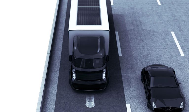 Hybrid truck and blue electric car