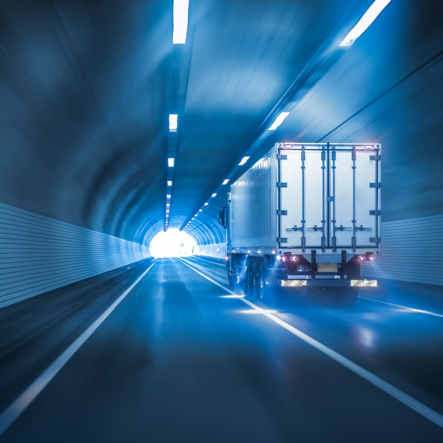 Trucks passing through tunnels