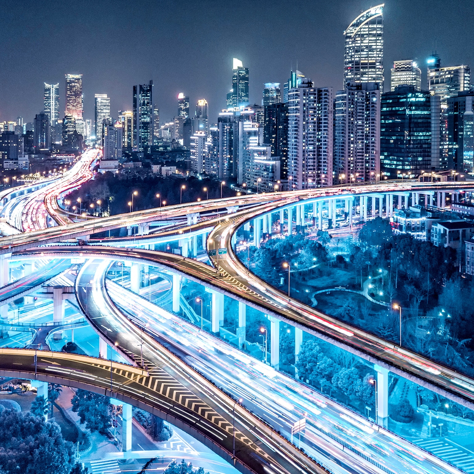 Busy interconnected highways at different levels against sky-scrapers in China