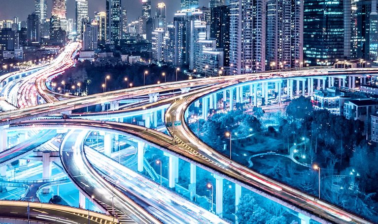 Busy interconnected highways at different levels against sky-scrapers in China