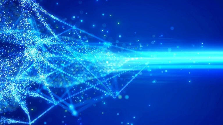 Light blue digital light points and beams against a dark blue background indicating network data transfer speed