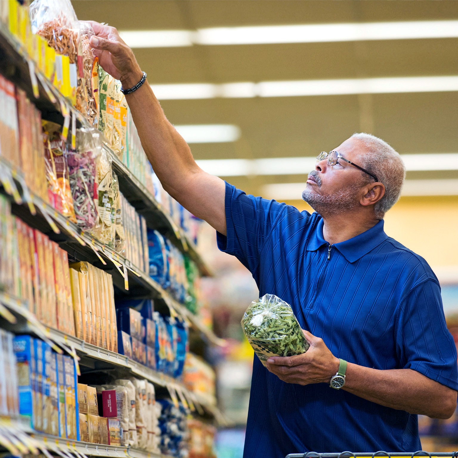 African American man shopping in grocery store