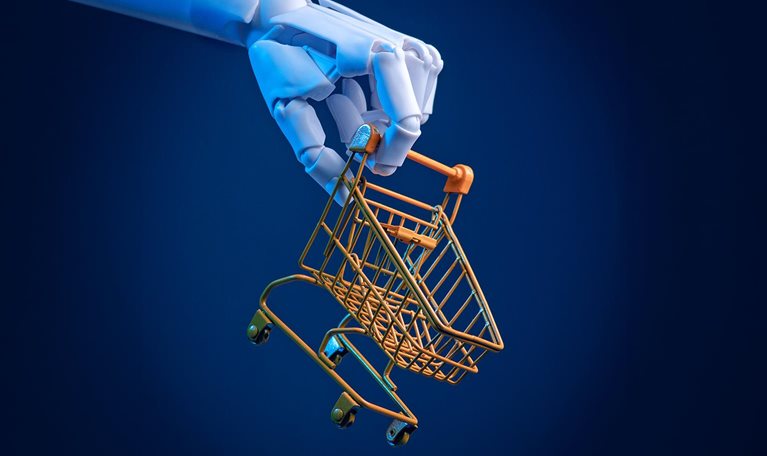 Robotic hand holding a miniature shopping cart: concept of e-commerce, automation and AI retail