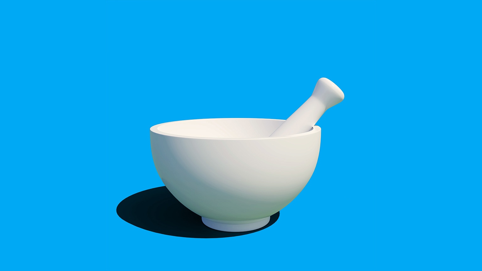 White stone mortar and pestle with a dramatic shadow on a vibrant blue background.