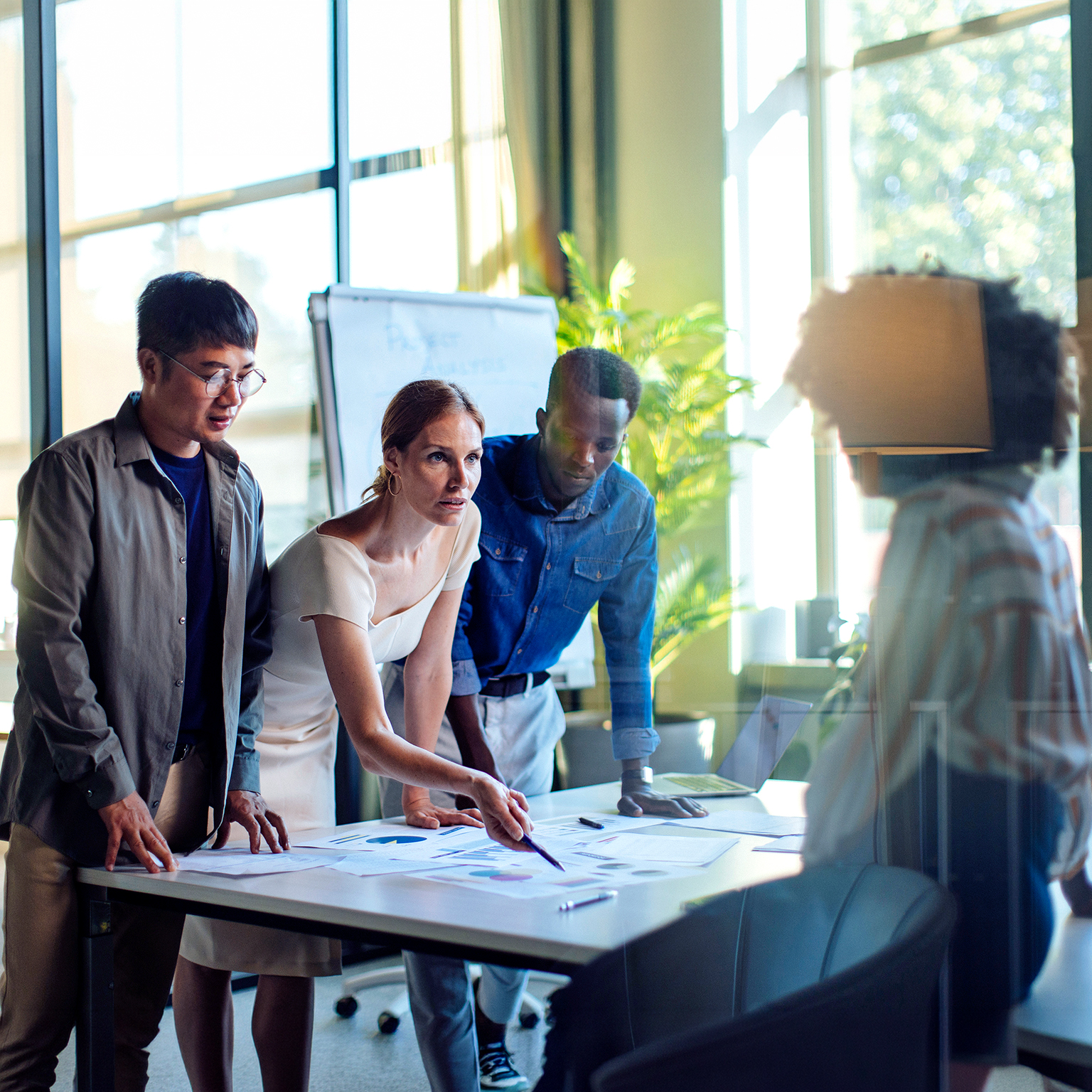 Focused team working collaboratively during a business strategy planning session