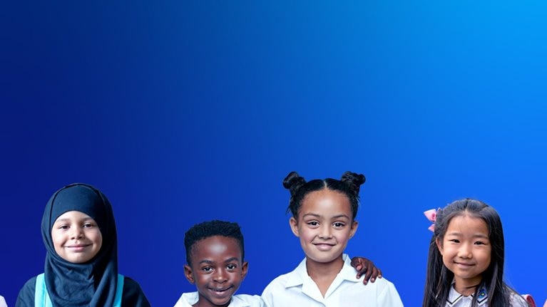 Diverse group of smiling students standing together. - stock photo