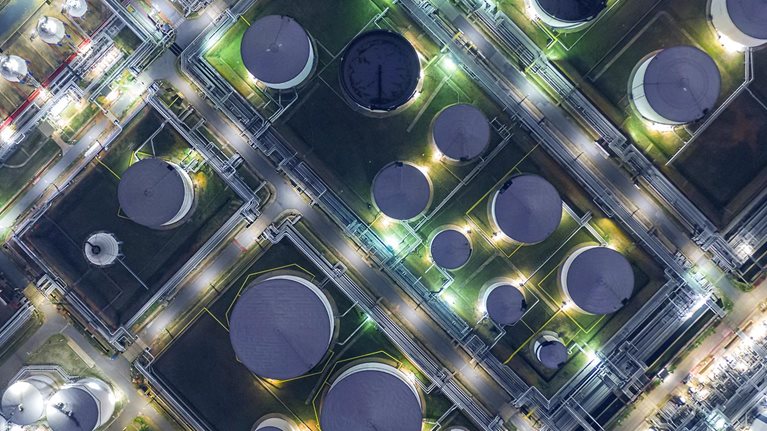 Aerial view oil terminal is industrial facility for storage of oil and petrochemical products ready for transport to further storage facilities