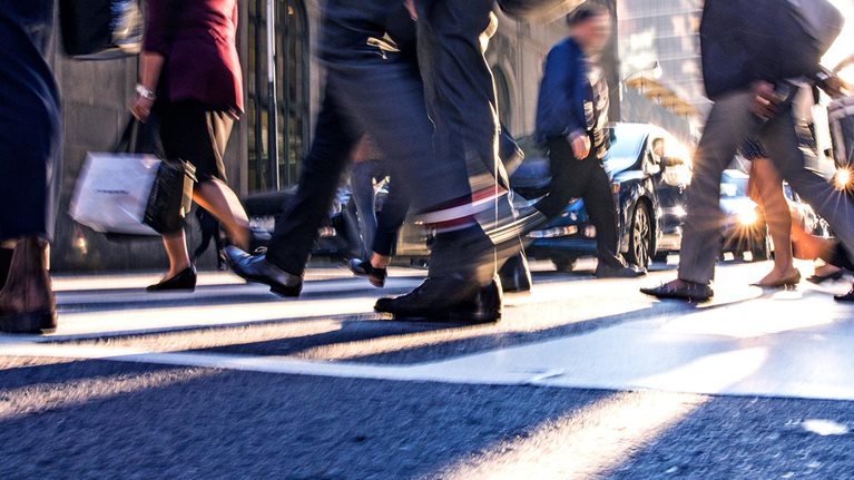 Crosswalk, people crossing in downtown