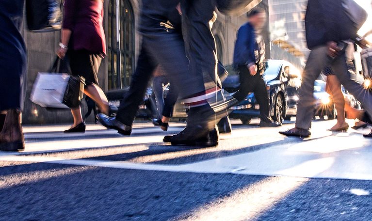 Crosswalk, people crossing in downtown