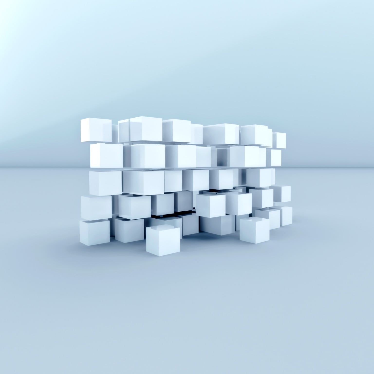 A cluster of semi floating white cubes on a light background