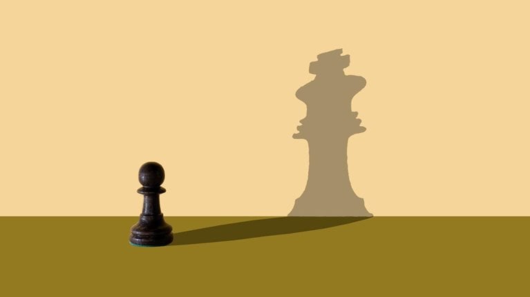 Unexpected shadows in the chess game - stock photo