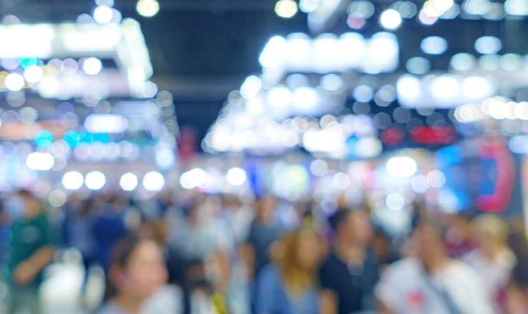 Blur, defocused background of public exhibition hall. Business tradeshow, job fair,