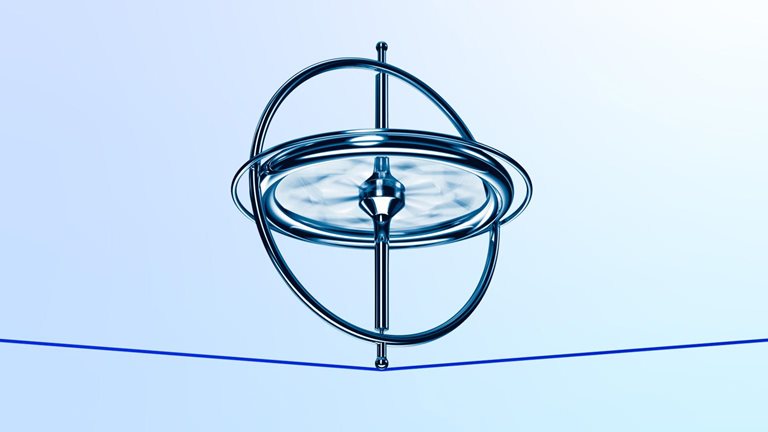 A metallic gyroscope spins on a thin red tread which bends slightly from the weight. The scene is set against a soft blue and white gradient background.