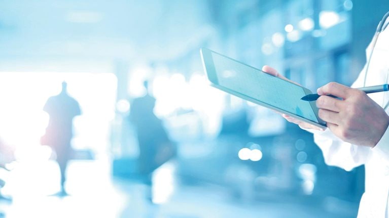 Medicine doctor and stethoscope touching medical information network connection interface on digital tablet in hospital background