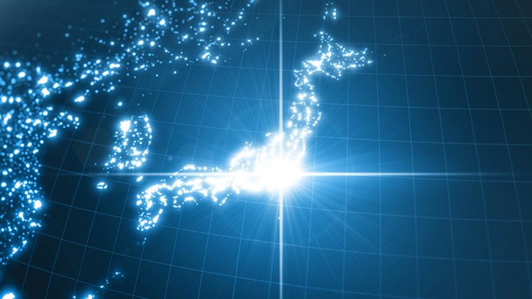 Power of Japan, energy beam on Tokyo. dark globe with illuminated cities and human density areas.