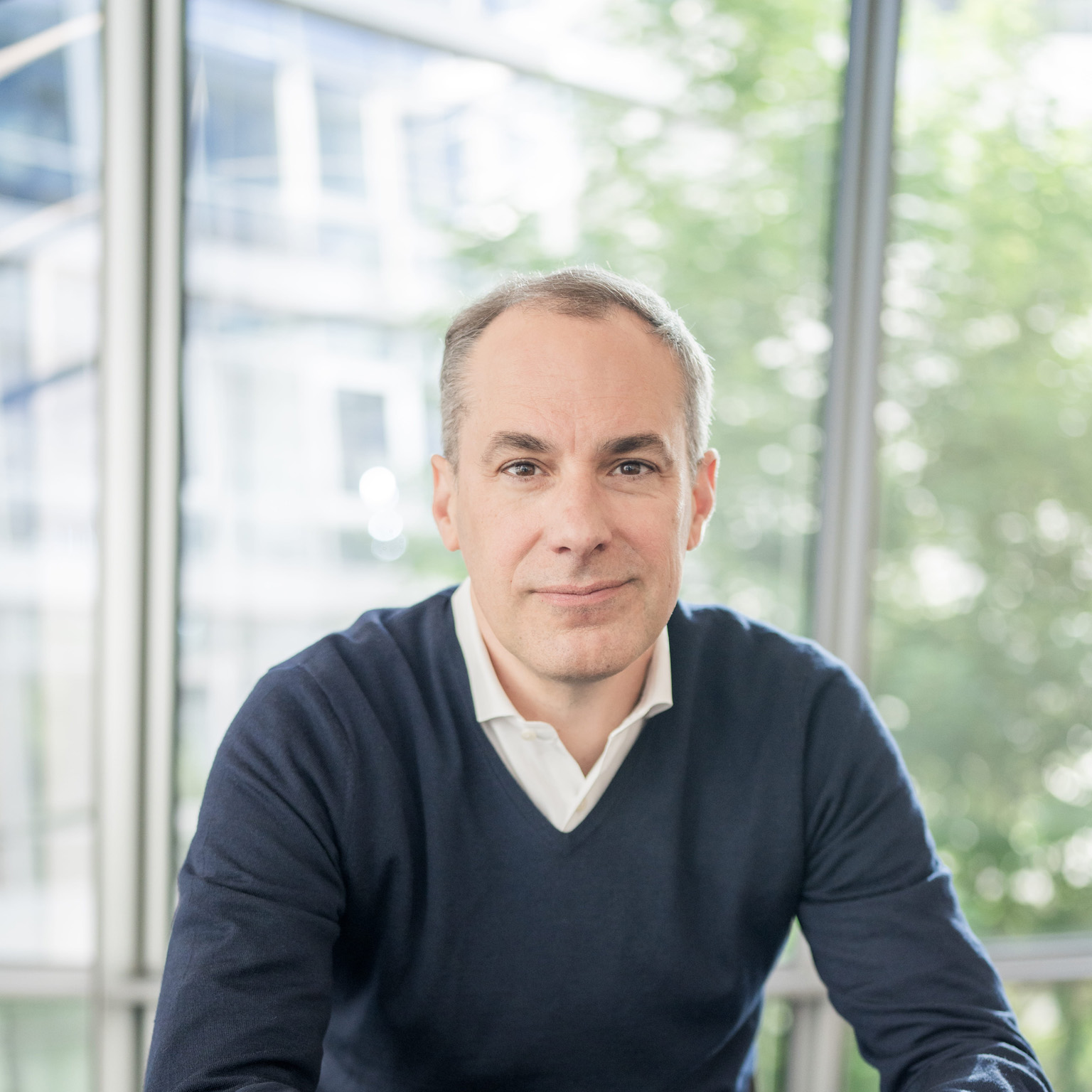 Smiling portrait image of Cedrik Neike