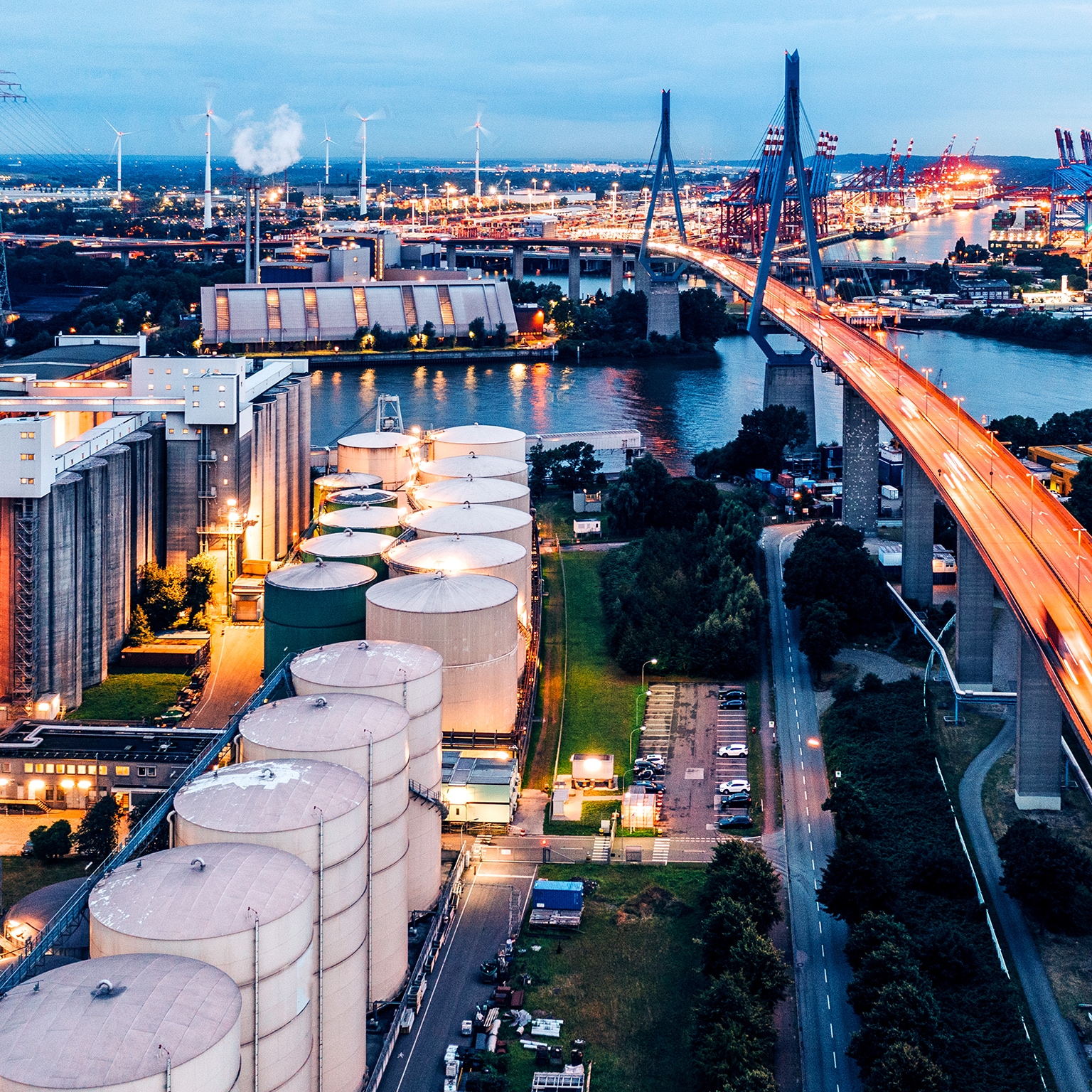 An aerial view of an industrial zone / power station at night