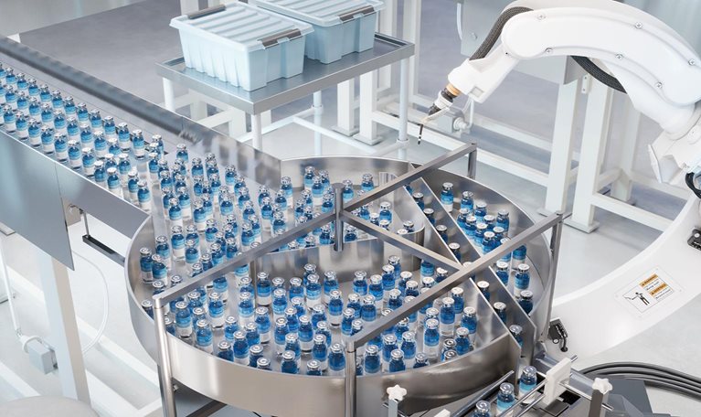 An automatic medicine manufacturing factory. Robotic arm working on medicine manufacturing production line.