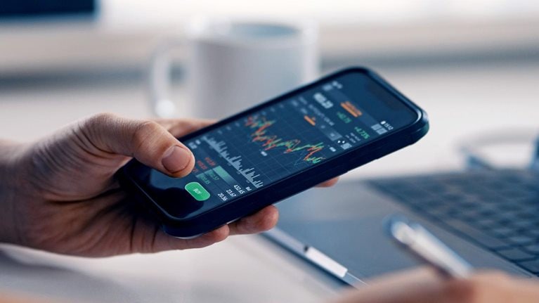 Man checking financial information on a smart phone