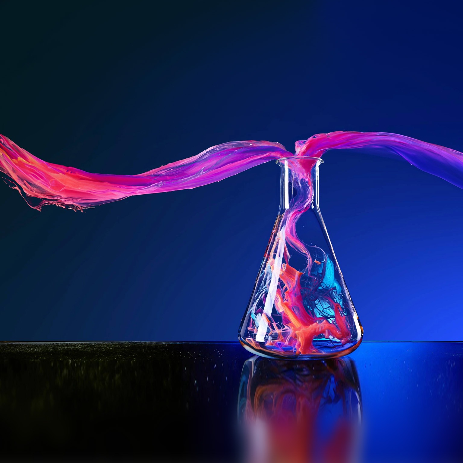 Image of colorful smoke gracefully swirling and mixing as it pours up and out of a vial.
