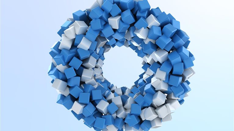 Blue and white 3D cubes form a circle