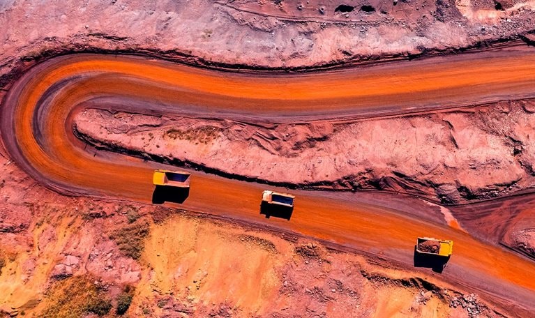 Aerial view of winding roads surrounding copper mine.