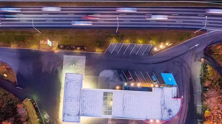 Aerial - Cars and Gas Station - stock photo