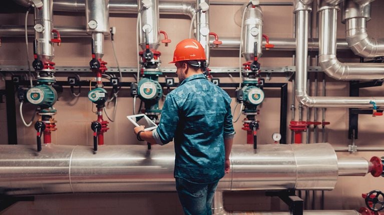 Stationary engineer at work - stock photo